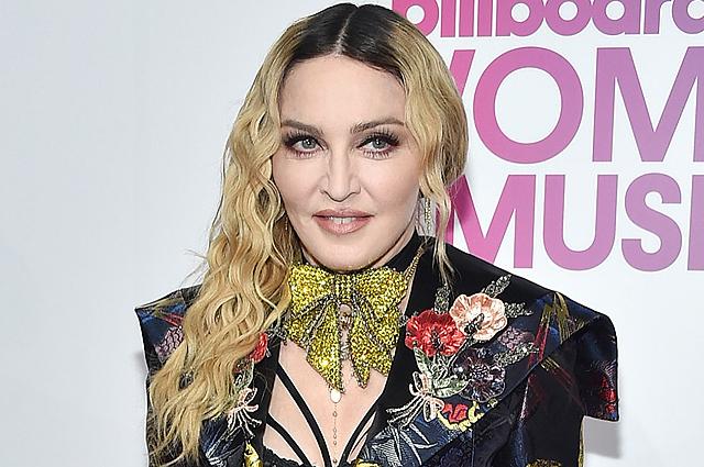 Madonna övladlığa daha iki uşaq götürür