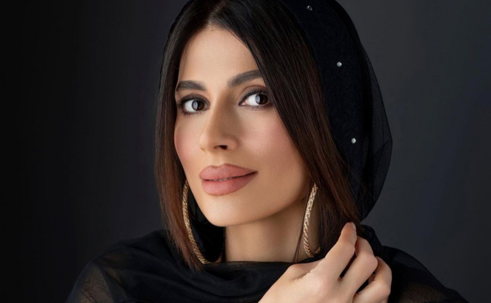 Qaraya bürünüb fotosessiya etdirdi
