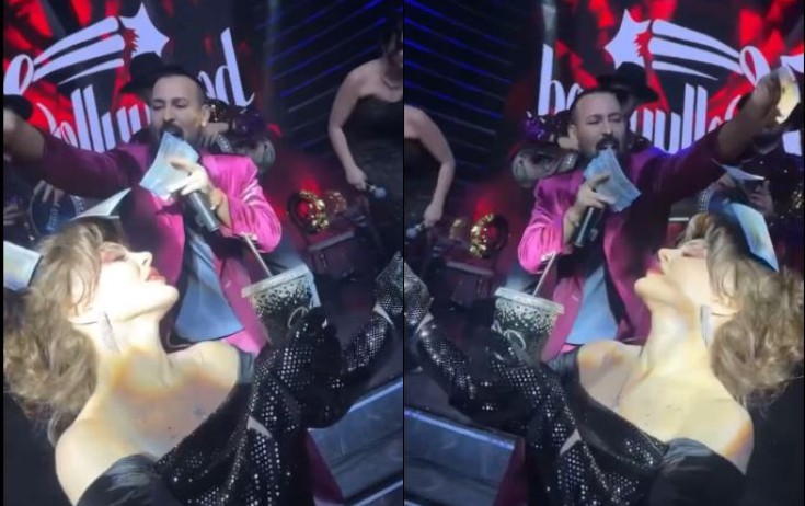 Niyam Xatunun başına "dollar" səpdi - Video