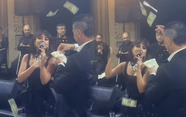 Güneli pul “yağışı”na tutdular - Video